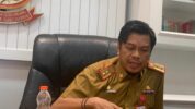 Penjabat (PJ) Sekda Makassar, Firman Hamid Pagarra saat ditemui di ruang kerjanya, Senin (13/5/2024). (Rakyat News/Dwiki).
